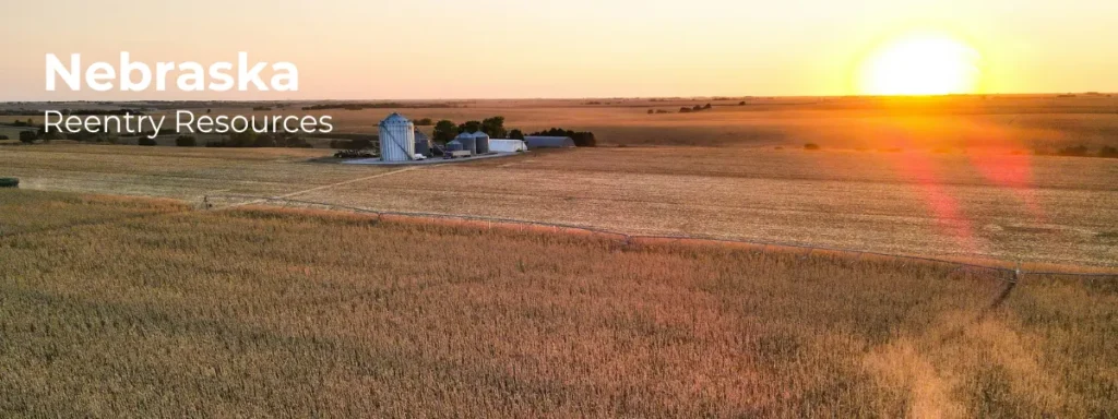 Nebraska reentry resources banner with farmland and rural landscape at sunset