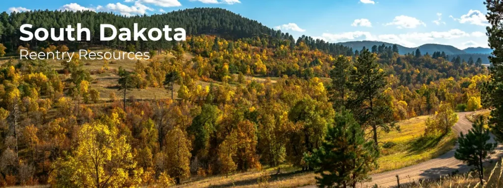South Dakota reentry resources banner with rolling hills and forest landscape