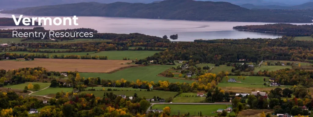 Vermont reentry resources banner with farmland and lake in autumn landscape